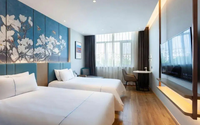 Magnolia Hotel (Dongying Qingfeng Hunan First Road Store)