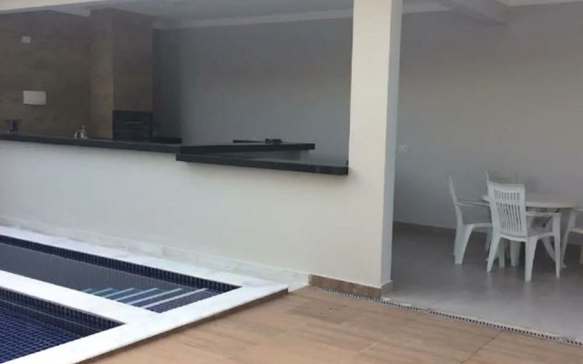 Casa com piscina em Caraguatatuba