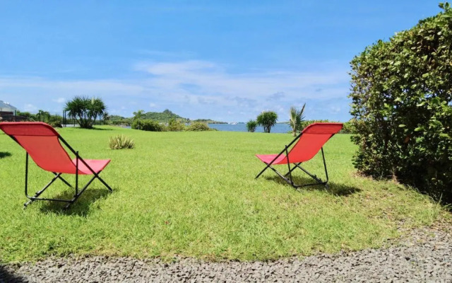 Le Baileys - Spacieux appartement en rez-de-jardin vue lagon