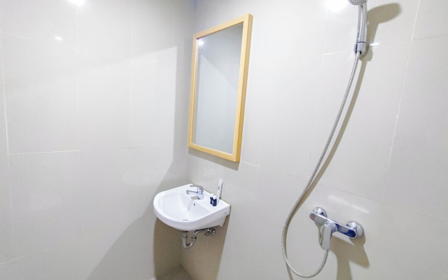 Wood Accents Studio At Grand Dharmahusada Lagoon Apartment