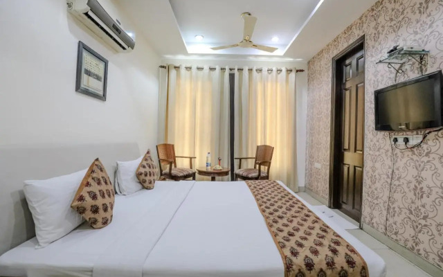 Cosy Grand @Chanakyapuri by The Cosy Hotels.