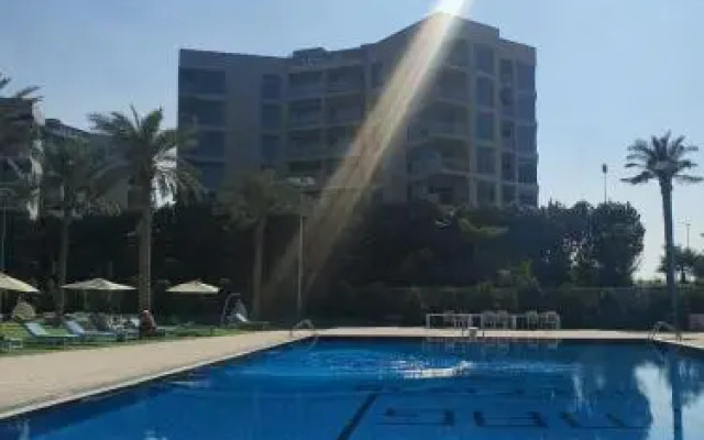 Cozy 1-bedroom apartment in Dubai South with Pool