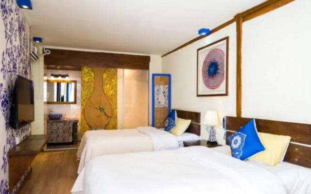 Lijiang Inn Chain Cloud Shore.Liu Chen