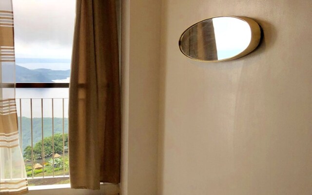 Dr. Calayan's Cozy Wind Residences Tagaytay Taal View
