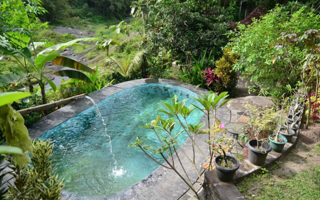 The Riverside Javanese Cottages