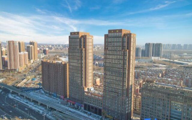 Happy Song Theme Hotel Apartment (Changchun Exhibition Center)