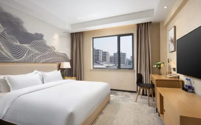 Tianhai Business Hotel (Jiujiang Liansheng Happy City Third Middle School Branch)