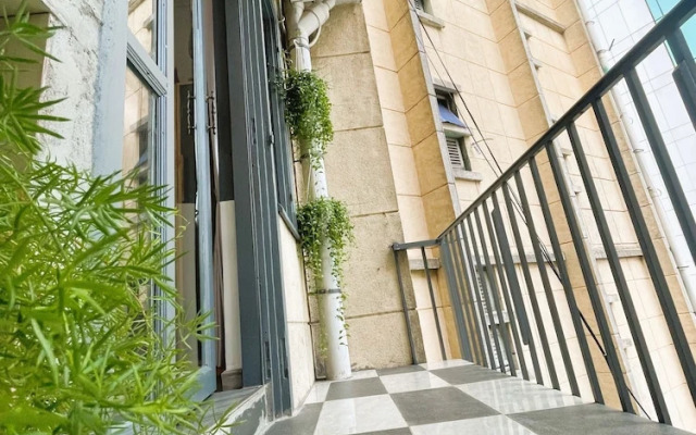 The Cafe Apartment Building