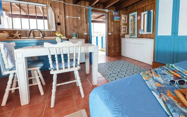 Wooden Cabin Next to the Beach