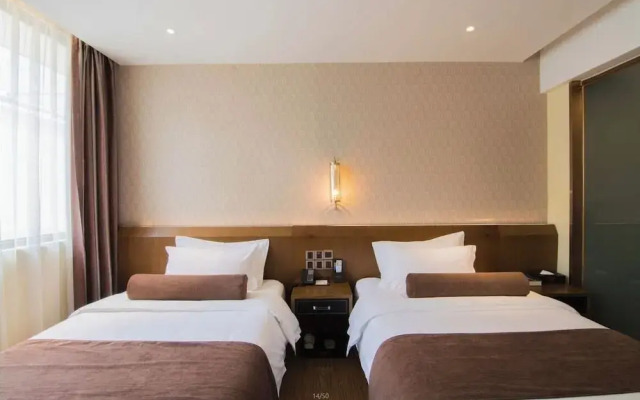 Xingyi Chain Hotel Jiangxia Metro Station