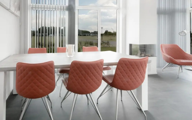 Nice Chalet with Fireplace near Oosterschelde