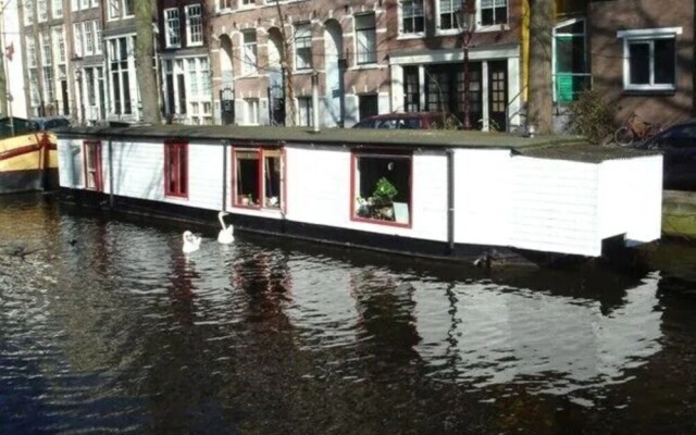 Houseboat in Amsterdam Old Center