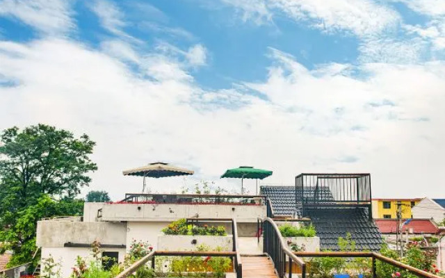 Beijing Jiuyue Shihong Homestay