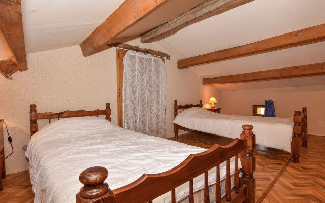 Lovely holiday home in Biron with fenced swimming pool