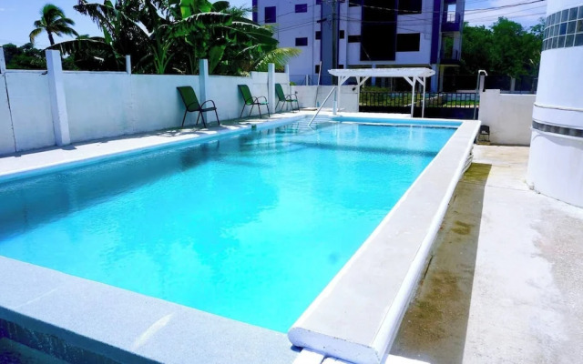 See Belize Waterside Sea View 2-bedroom Apartment w Balcony, Pool & Deck 2nd FL