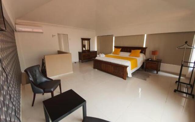 Malecon Rooms y Hotel