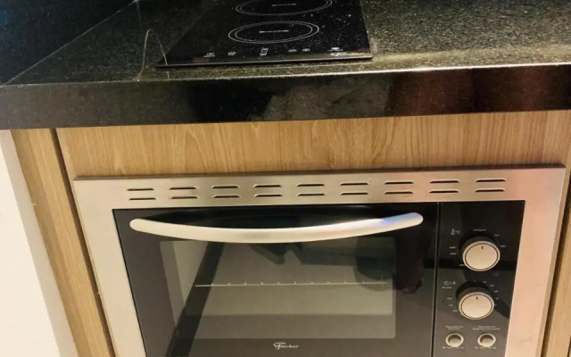 Loft 207 com vista para a piscina e Farol