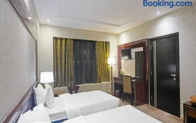 Capital O 596 Garden Palace Hotel