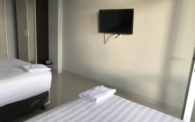 Louise Place by Oyo Rooms