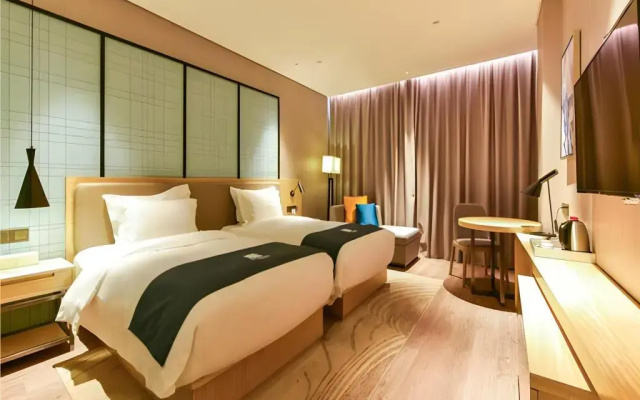 Echarm Hotel (Nanning Jiangnan Wanda Plaza Baisha Avenue)
