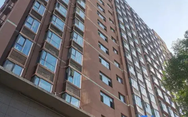 Yuehe Fashion Homestay (Zhengzhou Erqi Wanda Wanghuzhai Subway Station)