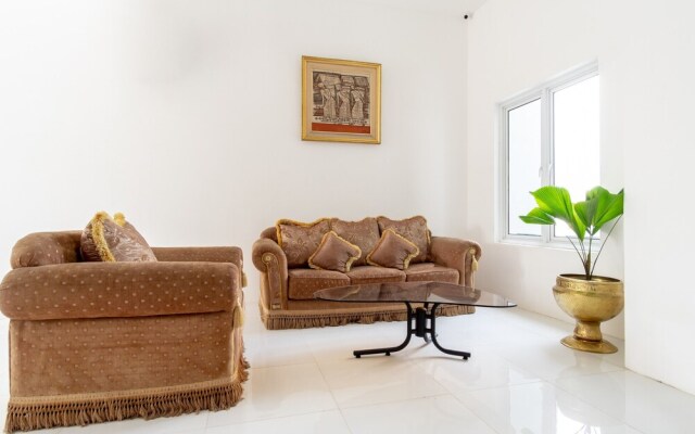 Capital O 92444 Kamojo Guest House