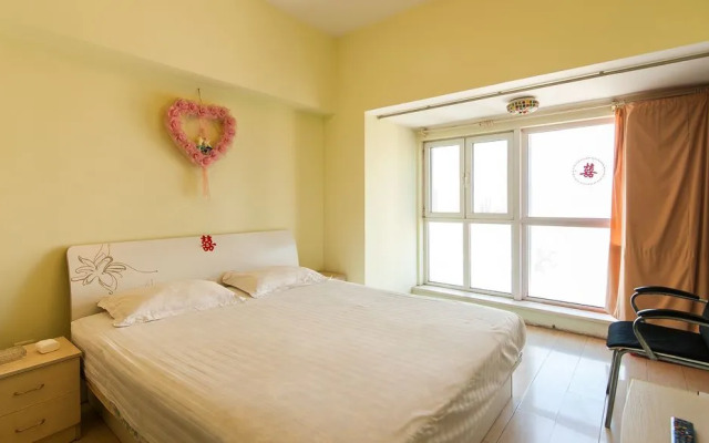 Tianjin Xinyi Apartment Hotel