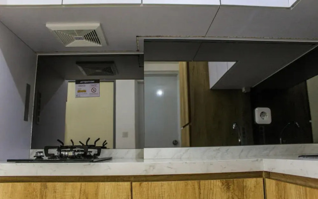 Relaxing 2BR Apartment at M-Town Residence By Travelio