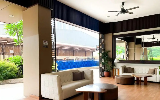 Basic Studio Room At Azalea Suites Apartment