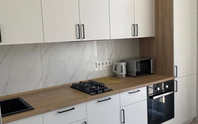 Апартаменты на улице Олега Анофриева 1 к9