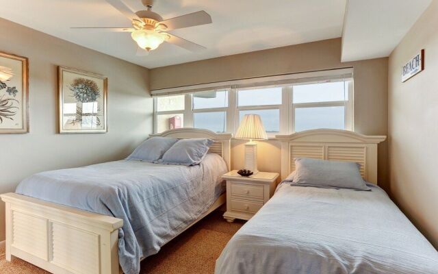 North End Corner Unit with View of the Ocean and Miles of Sandy Beach by RedAwning