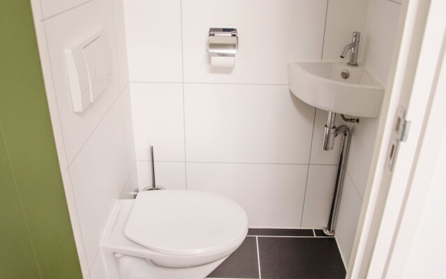 Nice house with a garden, surrounded by forest