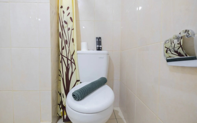 Modern White Studio At Springlake Summarecon Bekasi Apartment By Travelio