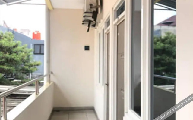 Simple Room at Kost Harian 45