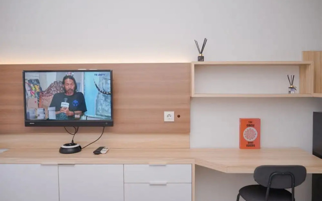 Minimalist Studio Room at Springwood Residence Tangerang Apartment