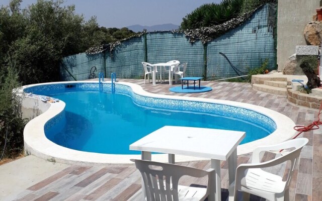 Villa With 3 Bedrooms in Città Metropolitana di Cagliari, With Wonderful sea View, Shared Pool, Furnished Terrace Near the Beach