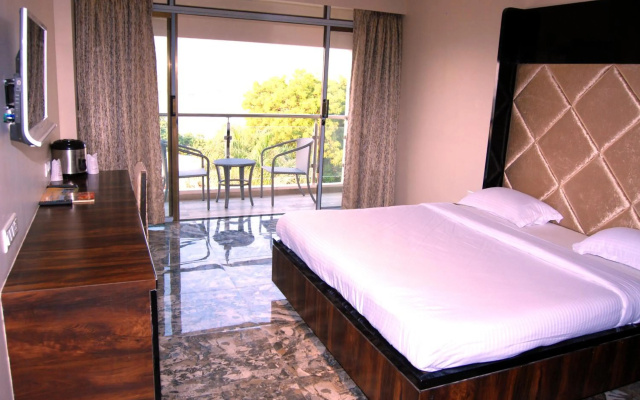 Hotel Apaar with Sea Face Garden Restaurant – Guest Rooms – Diu
