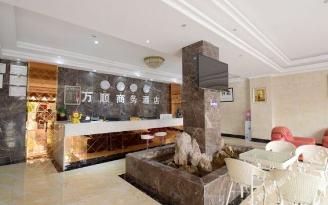 Oyo Xingyi Wanshun Business Hotel