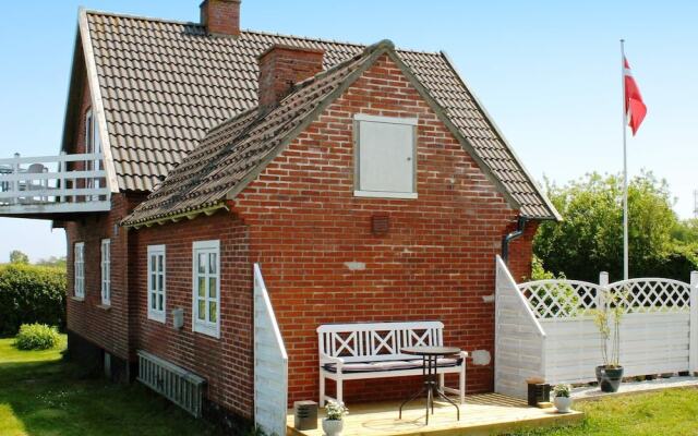 Cozy Holiday Home in Gudhjem near Golf Course