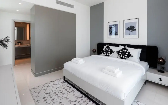 Elegant 2BR Emaar Beachfront Retreat