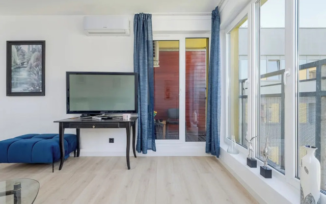 Wroclaw Dark Blue Apartment by Renters