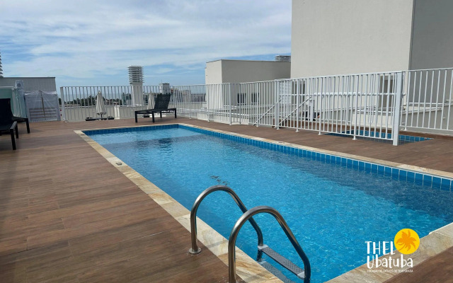 Apto completo e confortável com roupa de cama nas Toninhas  Condomínio Lumière