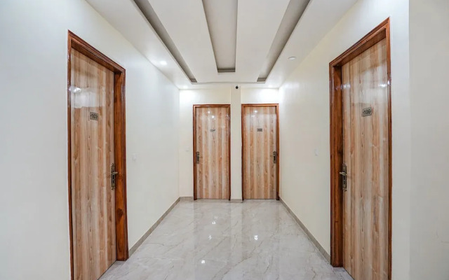 Fabhotel Ada Residency