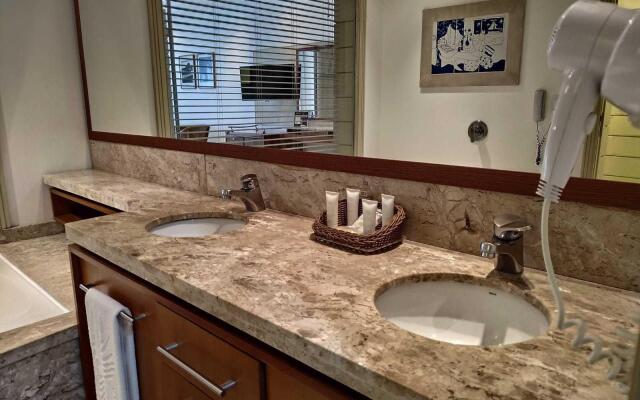 Studio vista mar pé na areia no Santinho STO2208