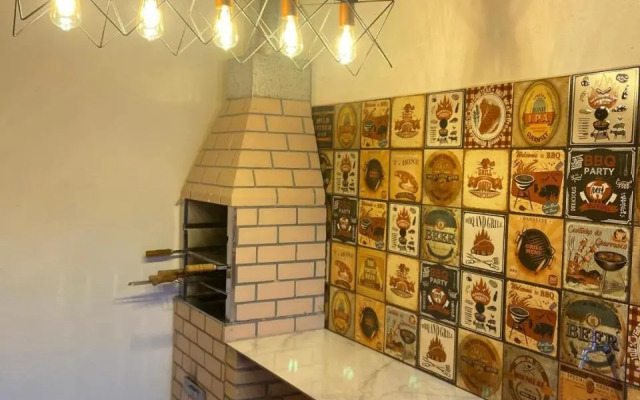 Casa em Bertioga condomínio 250 metros da praia