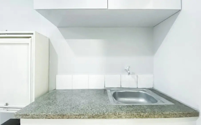 Stunning and Comfy Studio at Green Bay Pluit Apartment