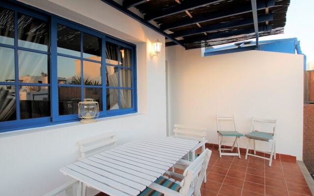 Casa Azul Acogedora y Moderna