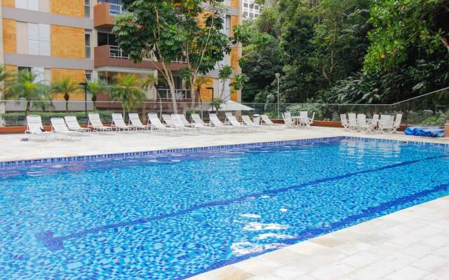 150m da praia com piscina aquecida e sauna