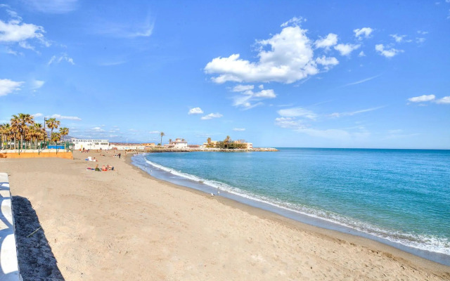 Apartamento con patio a 1 minuto de la playa