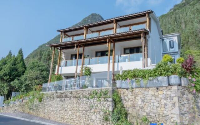 Xingyi Wanfenglin Ruhuazaoye Homestay (Baguatian Observation Deck)